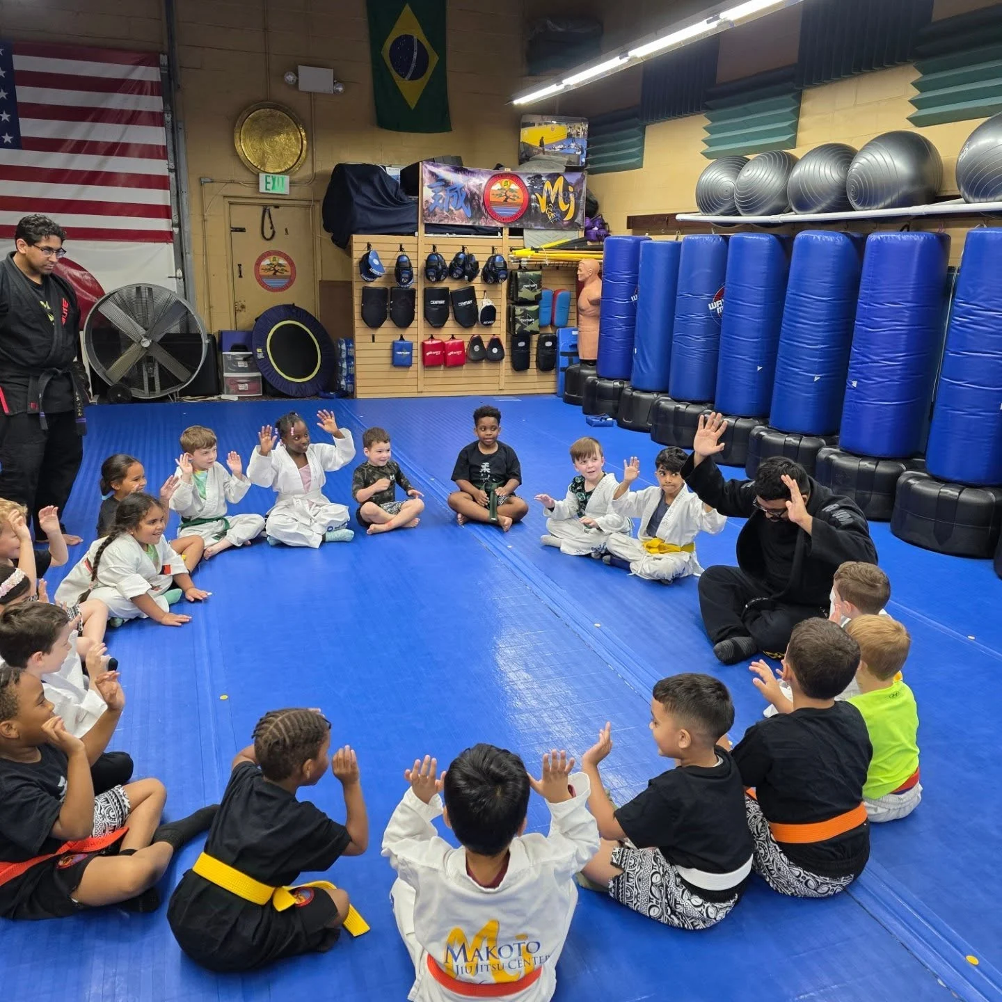 An instructor leading a Is Your Preschooler class at Makoto Jiu Jitsu Centers in Deer Park